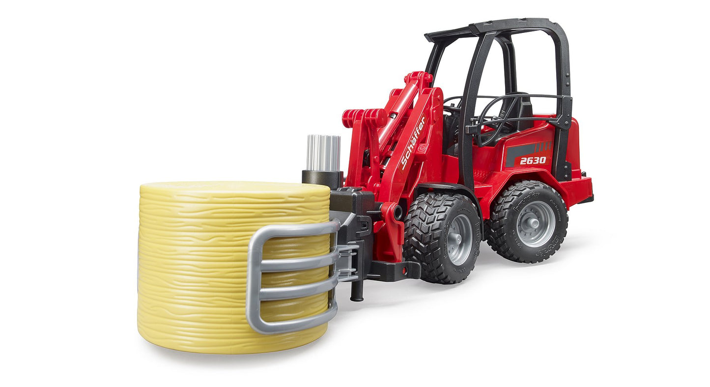 Bruder Schaffer Compact Loader 2034 W/Bale Gripper