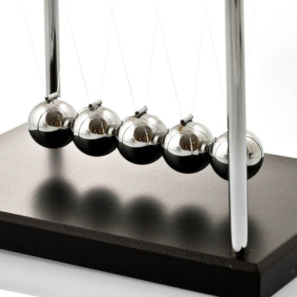 The Source Newtons Cradle