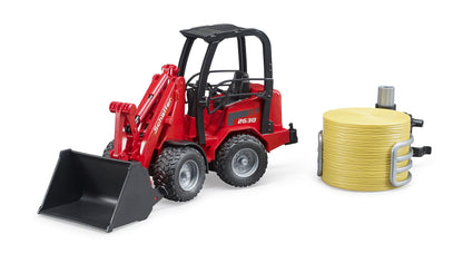 Bruder Schaffer Compact Loader 2034 W/Bale Gripper