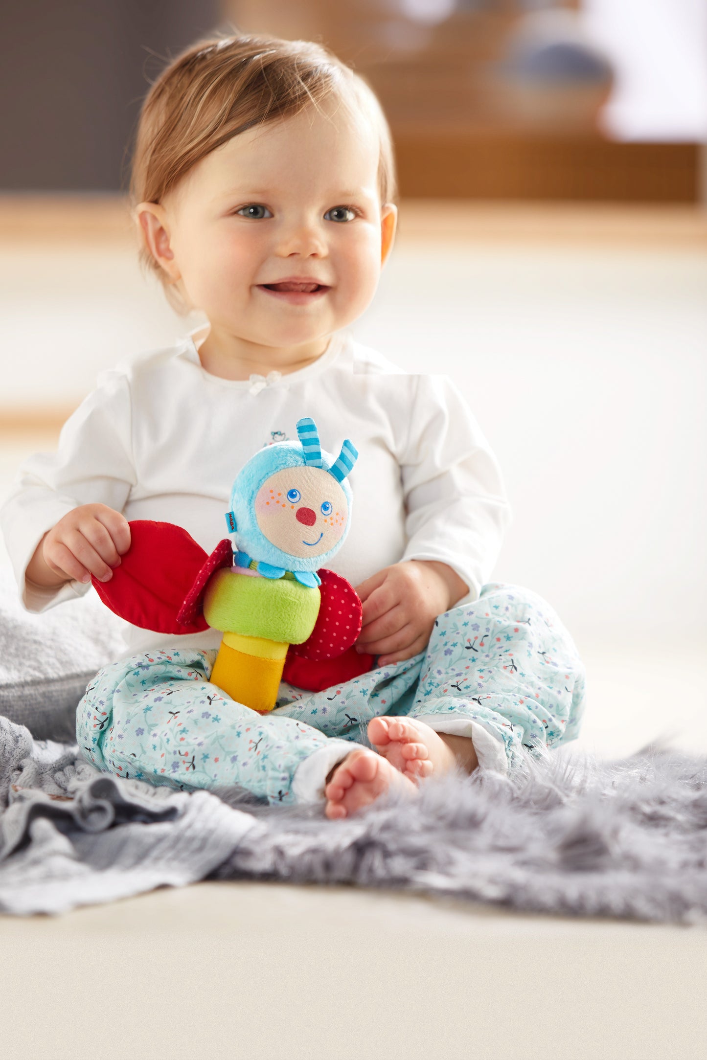 Haba Clutching Figure Caterpillar Mina